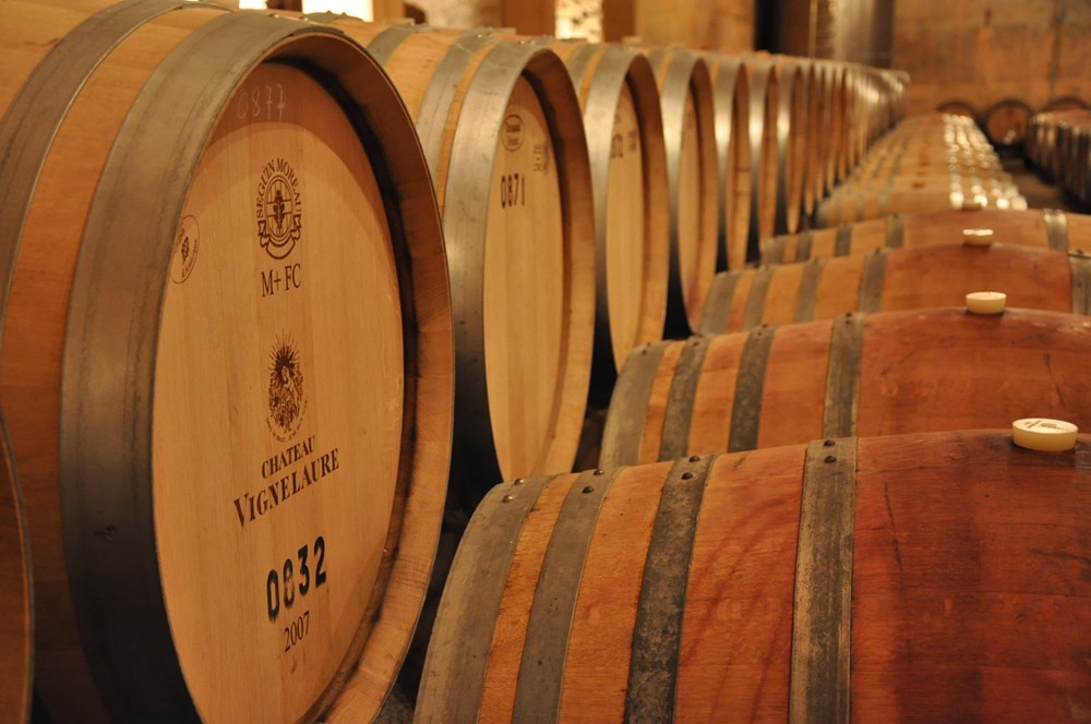 Oak barrels in the rock-hewn ageing cellar